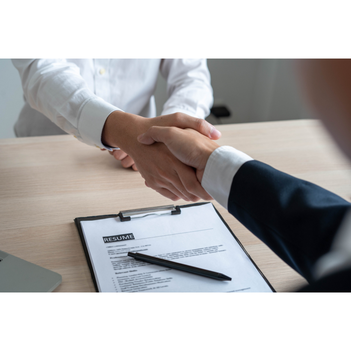 two people shaking hands